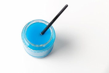 Paintbrush soaking in jar