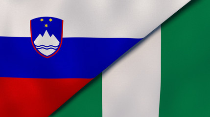 The flags of Slovenia and Nigeria. News, reportage, business background. 3d illustration