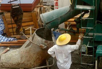 Construction workers with cement in Hong Kong © spiritofamerica