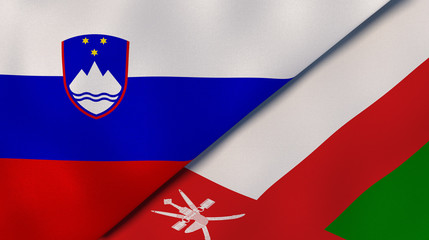 The flags of Slovenia and Oman. News, reportage, business background. 3d illustration