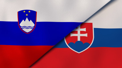 The flags of Slovenia and Slovakia. News, reportage, business background. 3d illustration