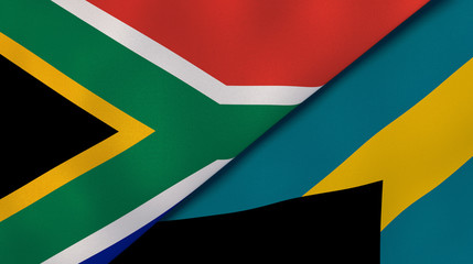 The flags of South Africa and Bahamas. News, reportage, business background. 3d illustration