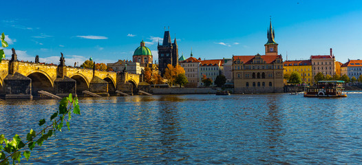 View of Charles bridge in autumn sunny day. Prague. Czech republic
