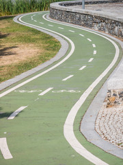 Green curved bikeway in Braganca, Portugal