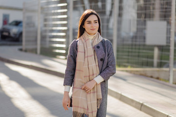 Woman portrait walking in the street