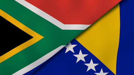 The flags of South Africa and Bosnia and Herzegovina. News, reportage, business background. 3d illustration