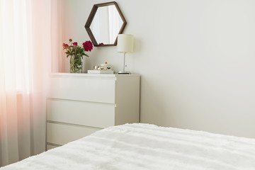 A part of modern bedroom in white colors