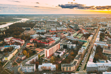 Fototapeta na wymiar Gomel, Belarus. Aerial View Of Homiel Cityscape Skyline In Autumn Evening. Residential District During Sunset. Bird's-eye View
