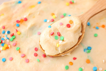 Spoon with sweet dough, closeup