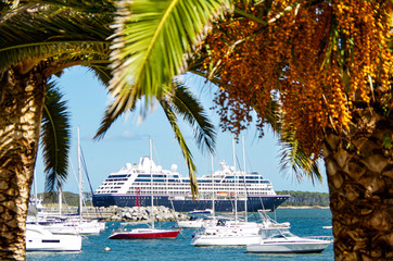 Luxury cruiseship or cruise ship liner Azamara Pursuit at sea with panoramic view of coastal...