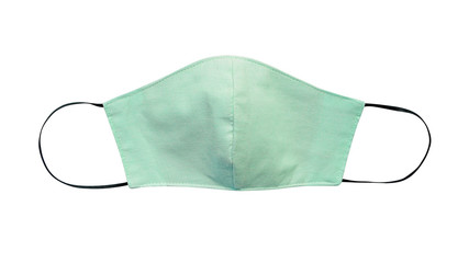 Green pastel cloth face mask isolated on white background with clipping path. Due to lack of...