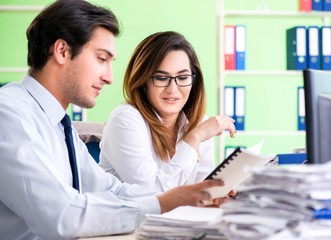 Two colleagues working in the office