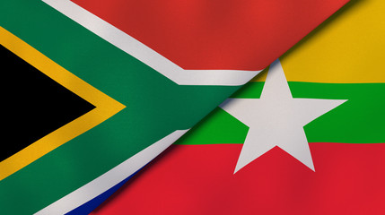 The flags of South Africa and Myanmar. News, reportage, business background. 3d illustration