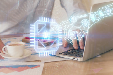 Double exposure of data internet theme hologram with man working on computer on background. Concept of innovation.