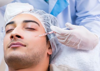Man visiting doctor for plastic surgery