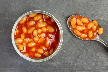 Baked beans on a gray background