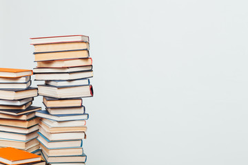 lots of stacks of educational books to teach in the library on a white background