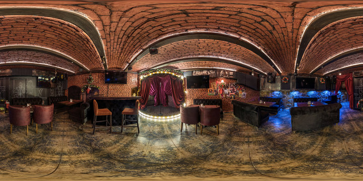 Full spherical seamless hdri  panorama 360 degrees in interior stylish vintage nightclub bar with brick wall and neon light in equirectangular projection. VR content