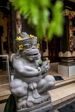 Traditional statue, an idol in the temple complex on the island of Bali, Indonesia