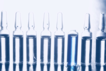 ampoules medicine vaccine concept, abstract background, vaccination virus protection