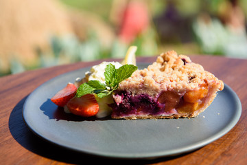 Blueberry Pie Delicious, See the blueberry pie texture, Served with whipped cream and strawberries Midsummer.