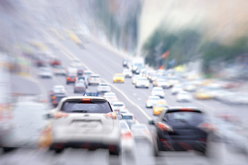 cars in the city road zoom movement / abstract blurred background, urban transport concept