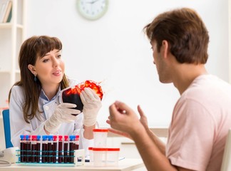 Man giving his blood as a donor