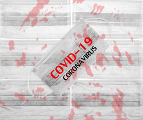 Medical mask for protection against flu or virus, epidemic and other diseases with words COVID-19 CORONAVIRUS.
