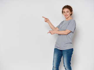 young woman pointing at something