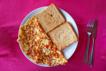 Fresh egg tomato cheese omlette   for breakfast - obrazy, fototapety, plakaty