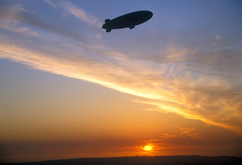 Blimp silhouette against a Japanese sunset