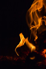 interesting shapes of fire tongues on black background