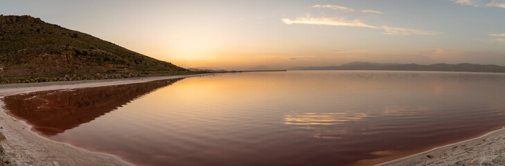 Maharloo pink lake in Shiraz during sunset with pink colored water, Iran