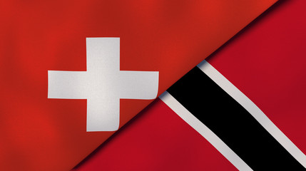 The flags of Switzerland and Trinidad and Tobago. News, reportage, business background. 3d illustration