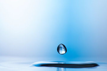 Fototapeta na wymiar High speed photograph of a water drop in motion