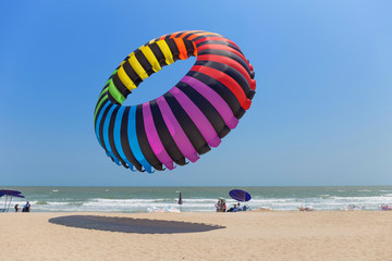 Big colorful of balloon kite on the beach in Thailand