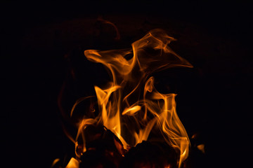 Fiery figures. Fire flames on black background