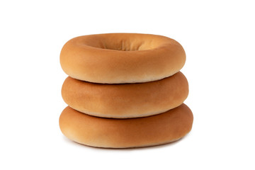 Bagel stacked on top of each other isolated on white background. Round bagel