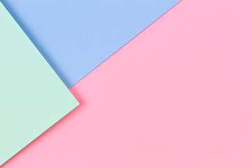 Abstract colored paper texture background. Minimal geometric shapes and lines in pastel pink, light blue and green colours