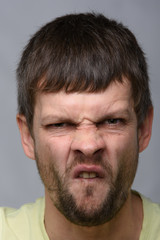 Fototapeta premium Closeup portrait of an ugly man of European appearance