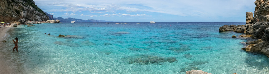 Obraz premium The beach of Cala Mariolu in Sardinia with turquoise water (Gulf of Orosei)