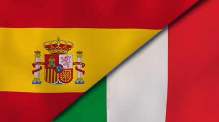 Obraz premium The flags of Spain and Italy. News, reportage, business background. 3d illustration