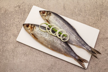 Pickled whole herrings. Traditional seafood delicacy, healthy eating concept