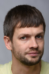 Obraz premium Portrait of a sad man of European appearance, slightly turned his head to the right