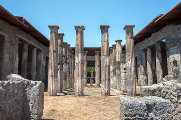 Ancient Doric columns stand in the remains of the House of Marcus Epidius Rufus (also known as the...