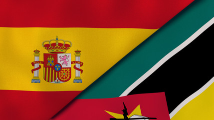 The flags of Spain and Mozambique. News, reportage, business background. 3d illustration