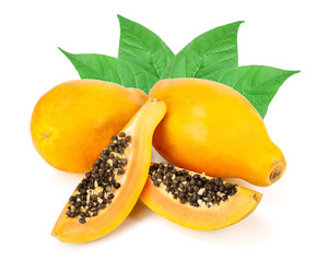 ripe cut papaya with leaves isolated on a white background