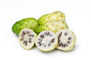 Noni or Morinda Citrifolia fruits isolated on white background.
