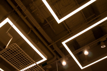 LED lamps and ceiling lighting in the mall. Moscow, Russia - April 14 2020