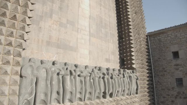 Close up of main facade frieze representing the apostles of Aranzazu sanctuary